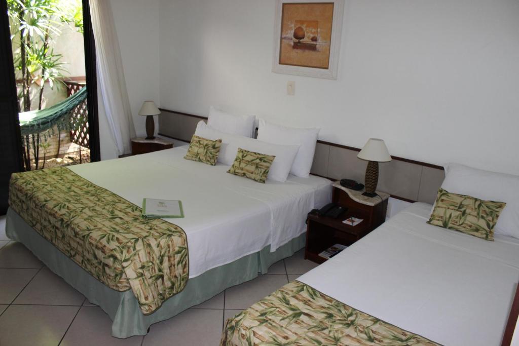 Hotel Ilhas Do Caribe - Na Melhor Regiao Da Praia Da Enseada Гуаружа Номер фото